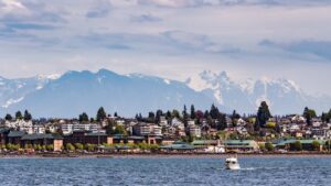 View of downtown Everett, WA and Puget Sound with surrounding mountains.