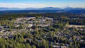 Aerial view of Mill Creek, Washington showing shops, parks, and neighborhoods.
